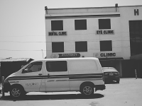 Photo of an ambulance in front of a clinic in Ghana